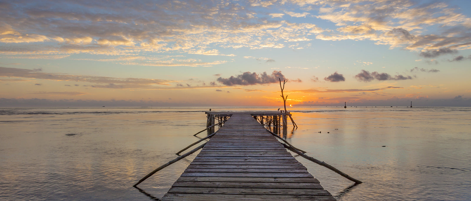 Sitting on the Dock of the Pass